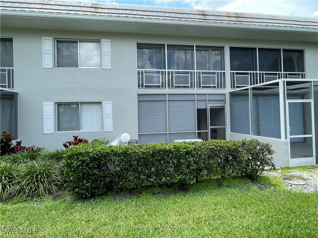 Property Photo:  215 Cypress Way E B2  FL 34110 