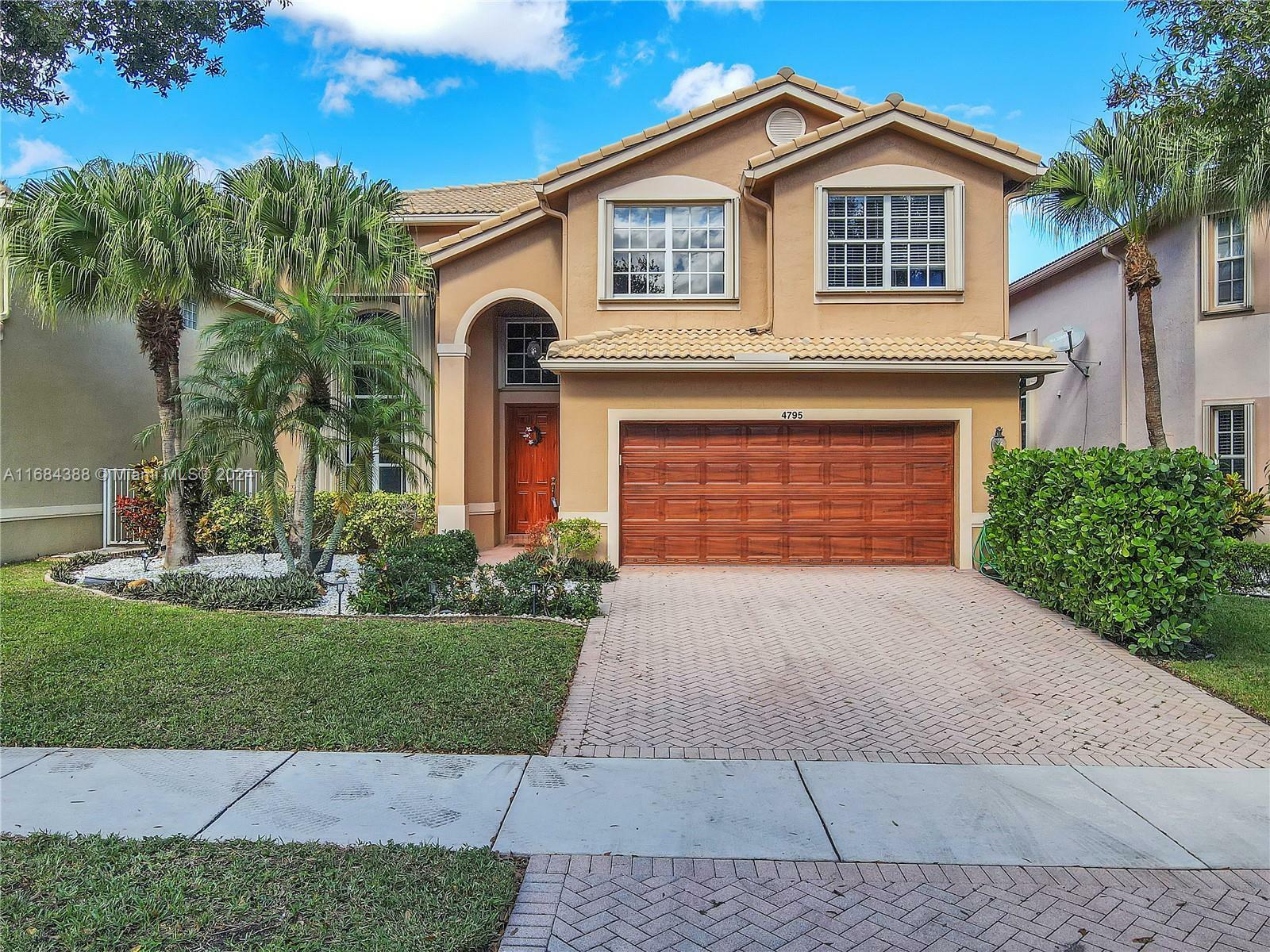 Property Photo:  4795 S Classical Blvd  FL 33445 