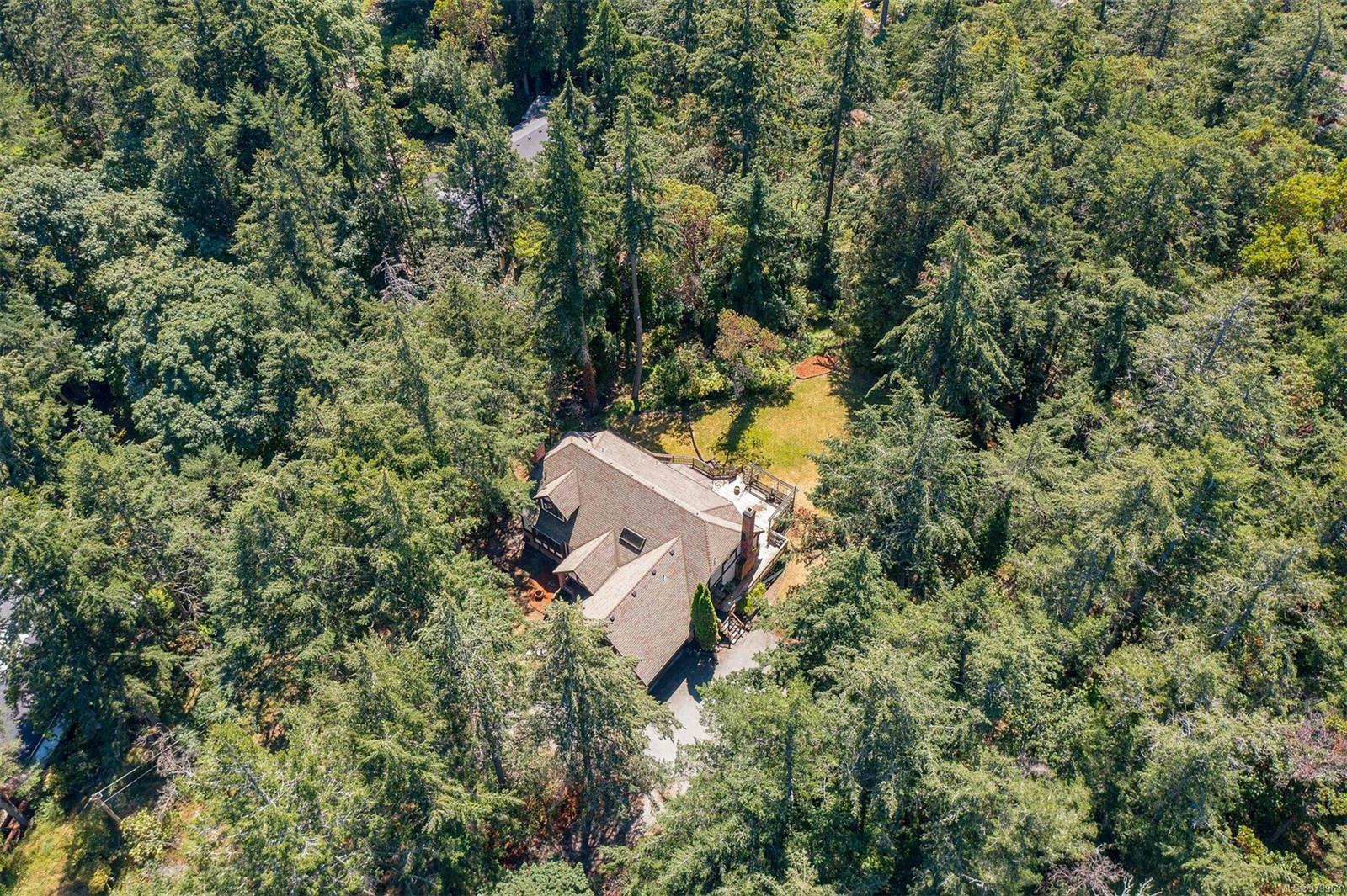 Property Photo:  2595 Queenswood Dr  BC V8N 1X6 