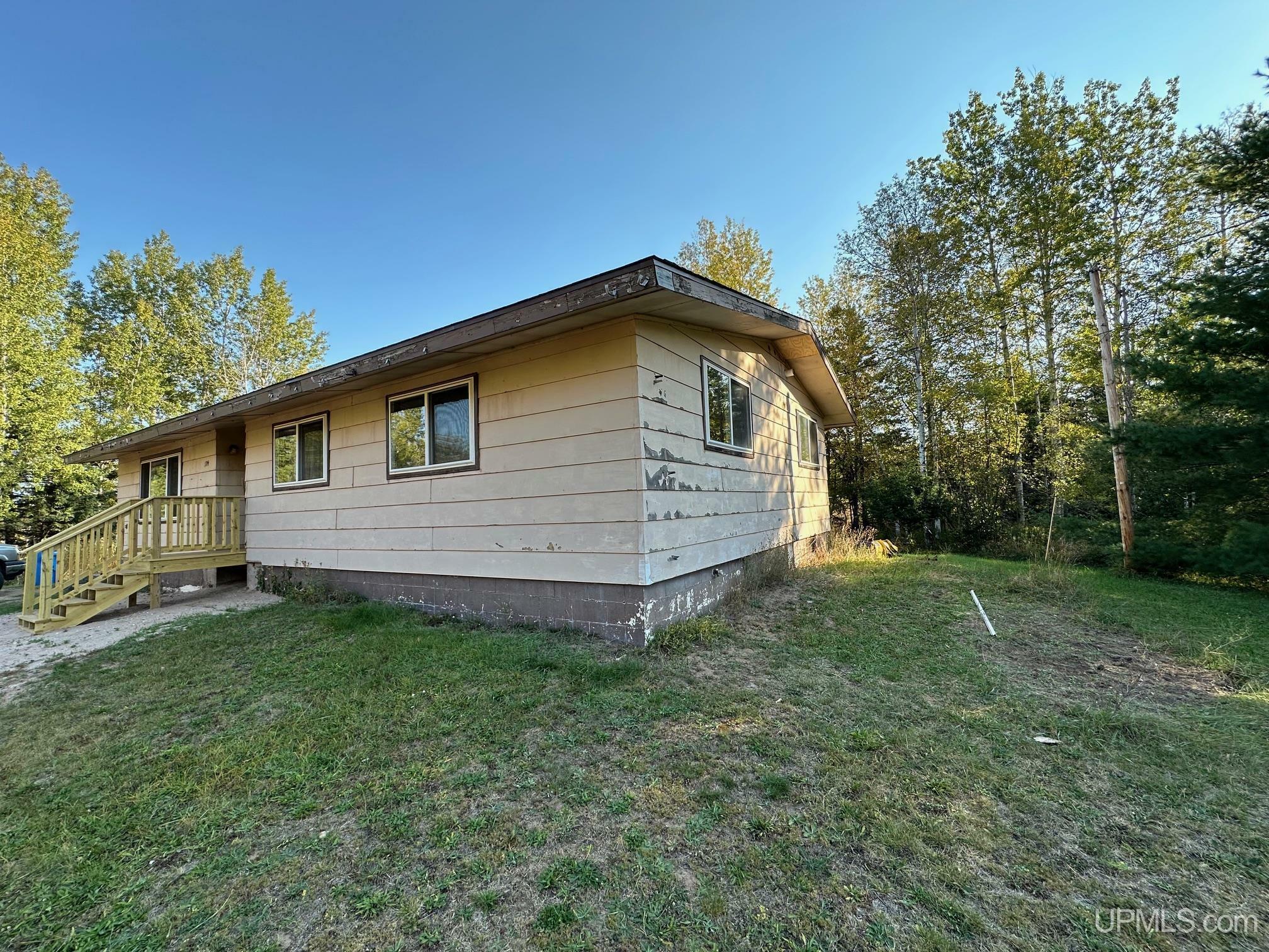 Property Photo:  174 Valley Road  MI 49866-9501 