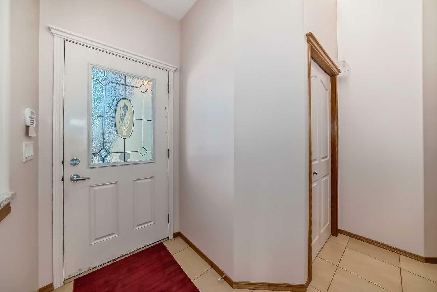 Property Photo:  180 Panatella Close NW  AB T3K 6B3 