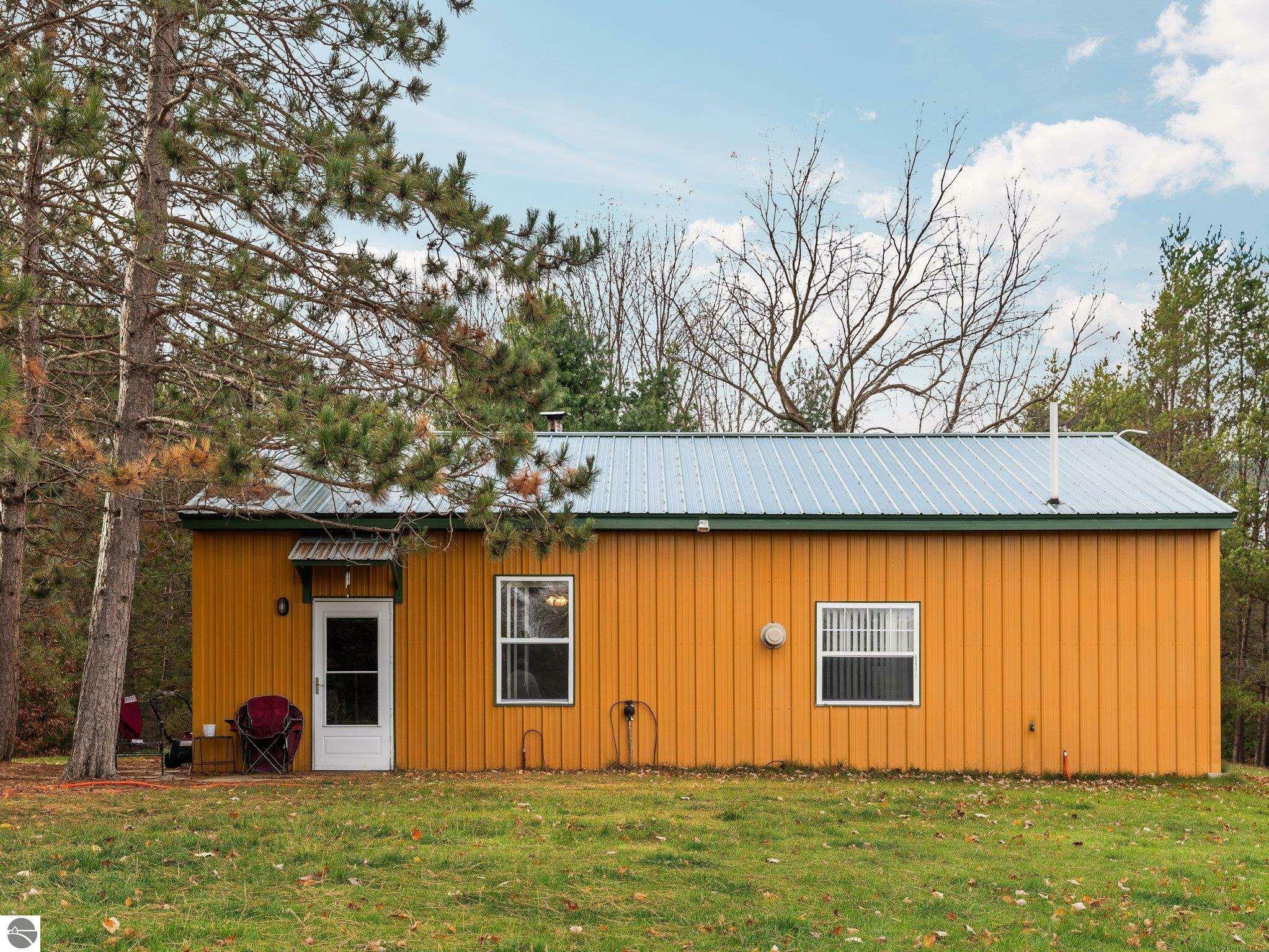 Property Photo:  1730 Old M-37  MI 49668 