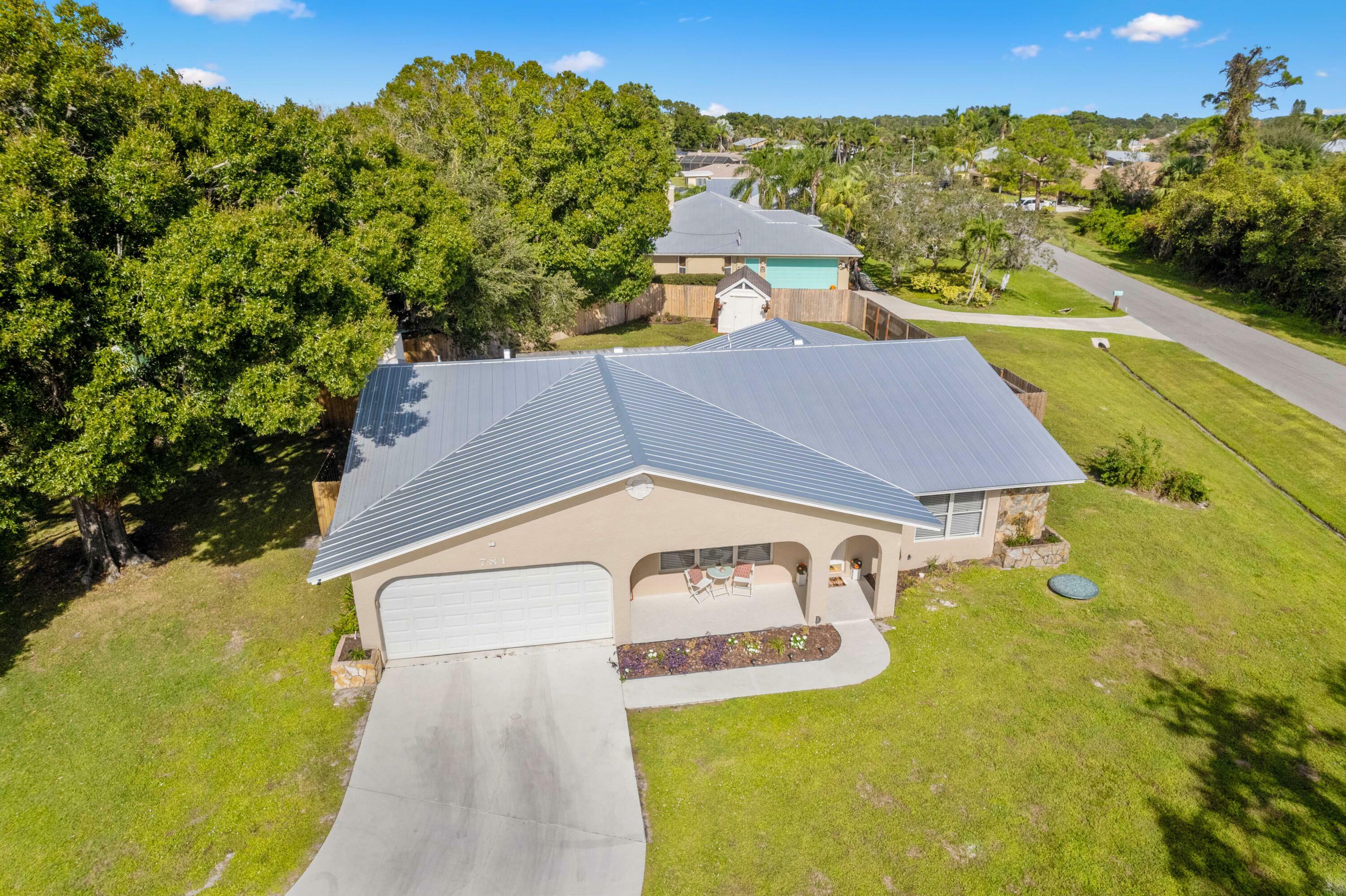 Property Photo:  781 SE Evans Avenue  FL 34984 