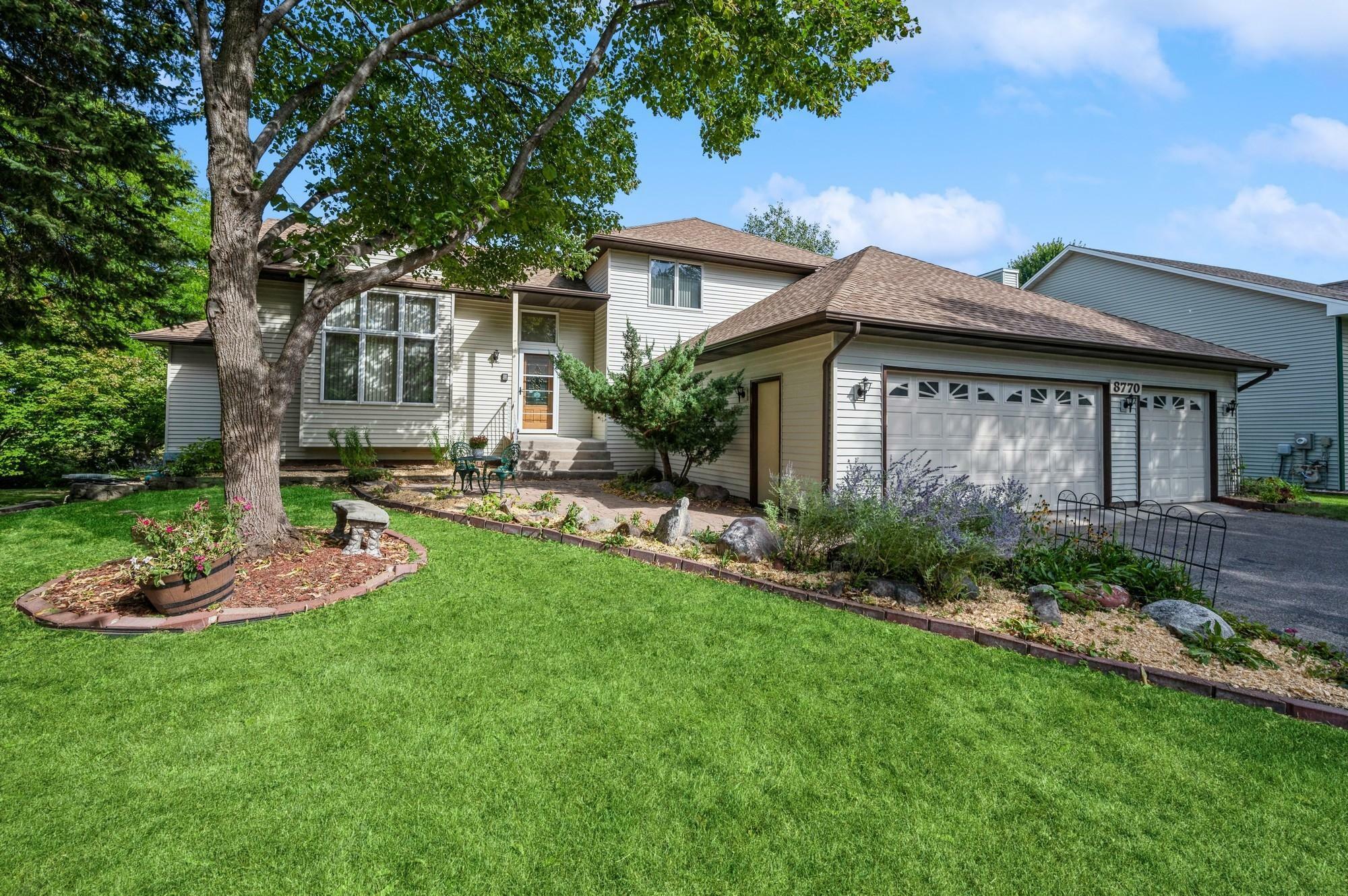 Property Photo:  8770 Norwood Lane N  MN 55369 