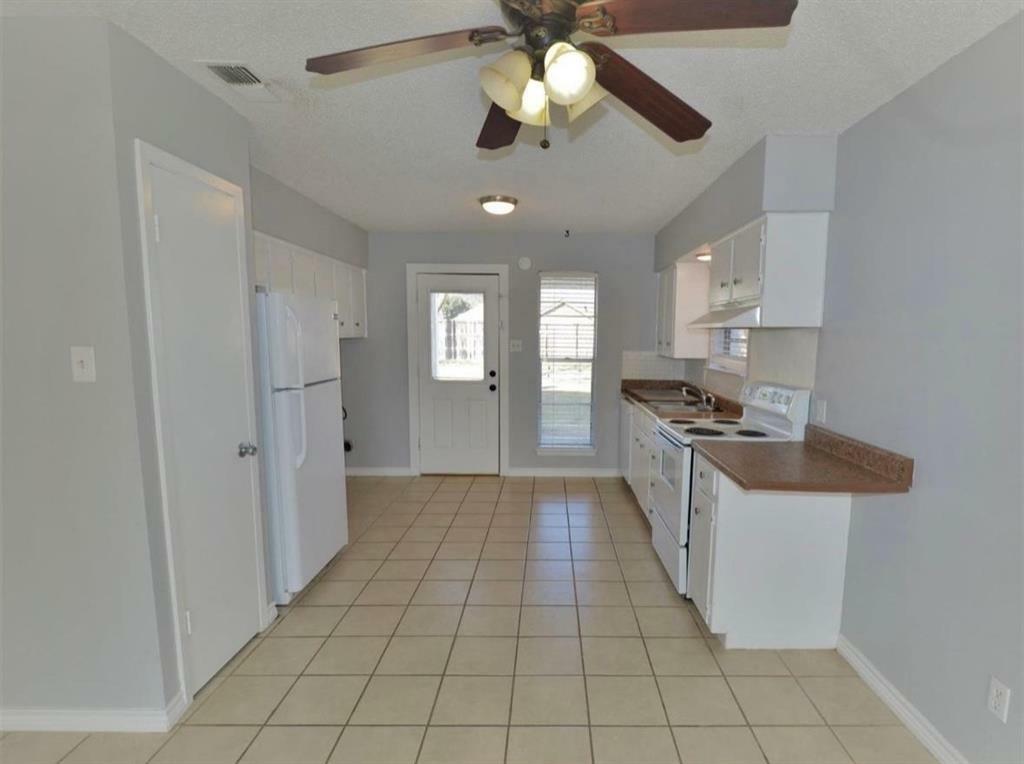 Property Photo:  205 N 5th  TX 76065 