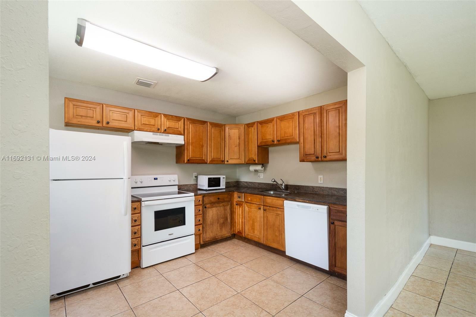 Property Photo:  3540 NW 7th Pl  FL 33311 