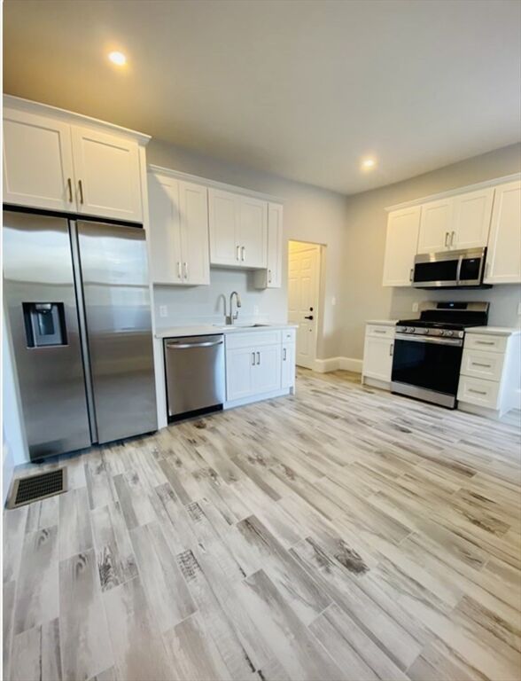 Property Photo:  874 Adams St  MA 02124 
