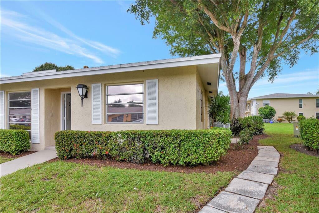 Property Photo:  13725 Flora Place D  FL 33484 