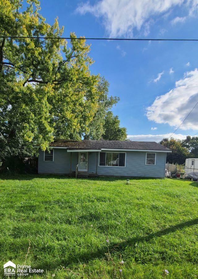 Property Photo:  1057 Nutana Boulevard  MI 48458 