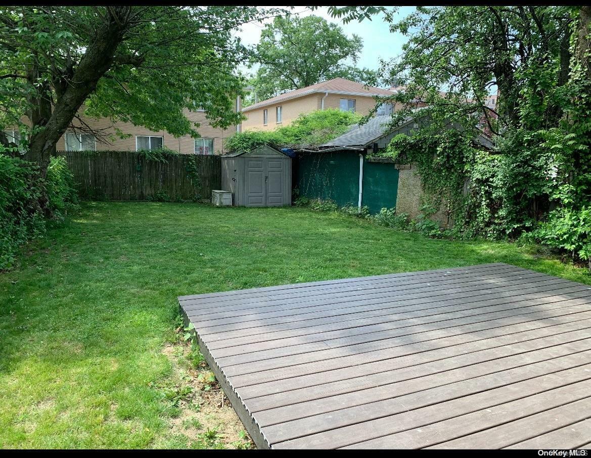 Property Photo:  76-22 57th Road  NY 11379 