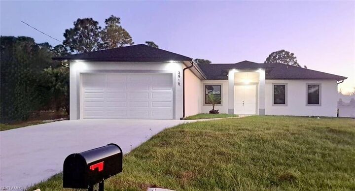 Property Photo:  2915 28th St SW  FL 33976 