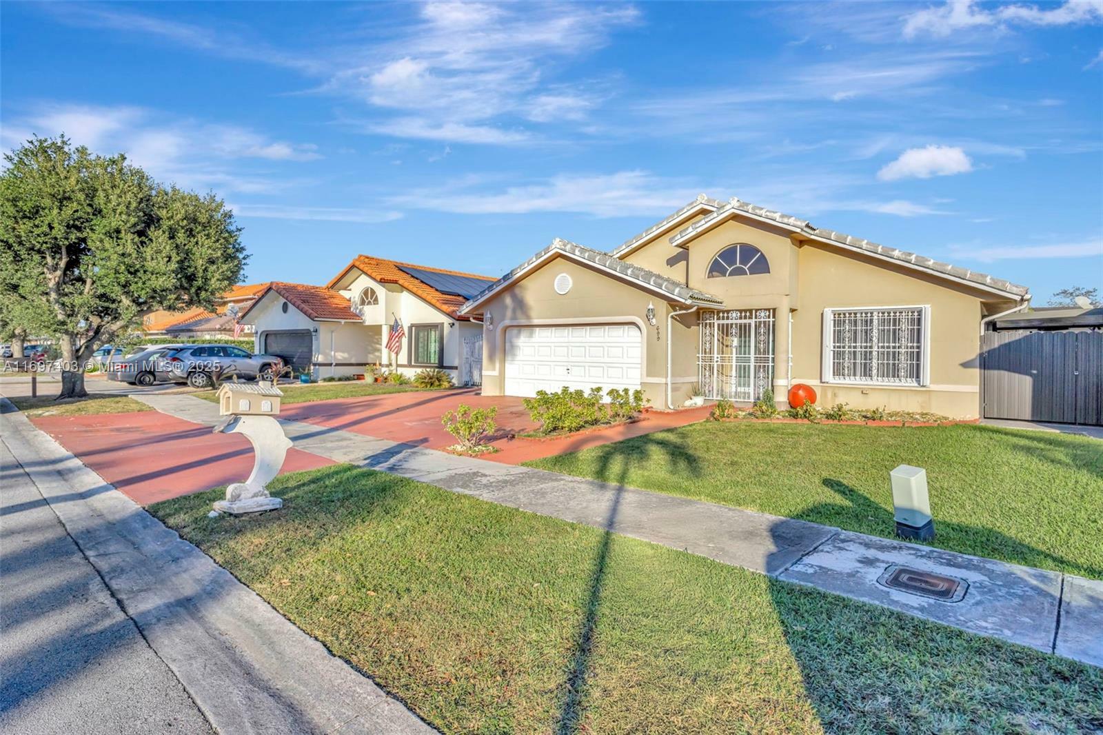 Property Photo: 699 NW 134th Pl FL 33182