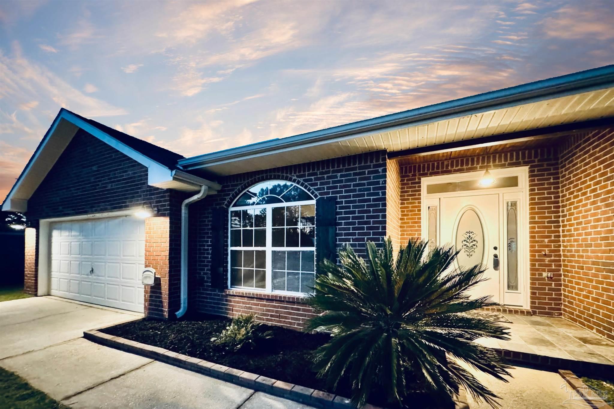 Property Photo: 5760 Farrel Way FL 32583