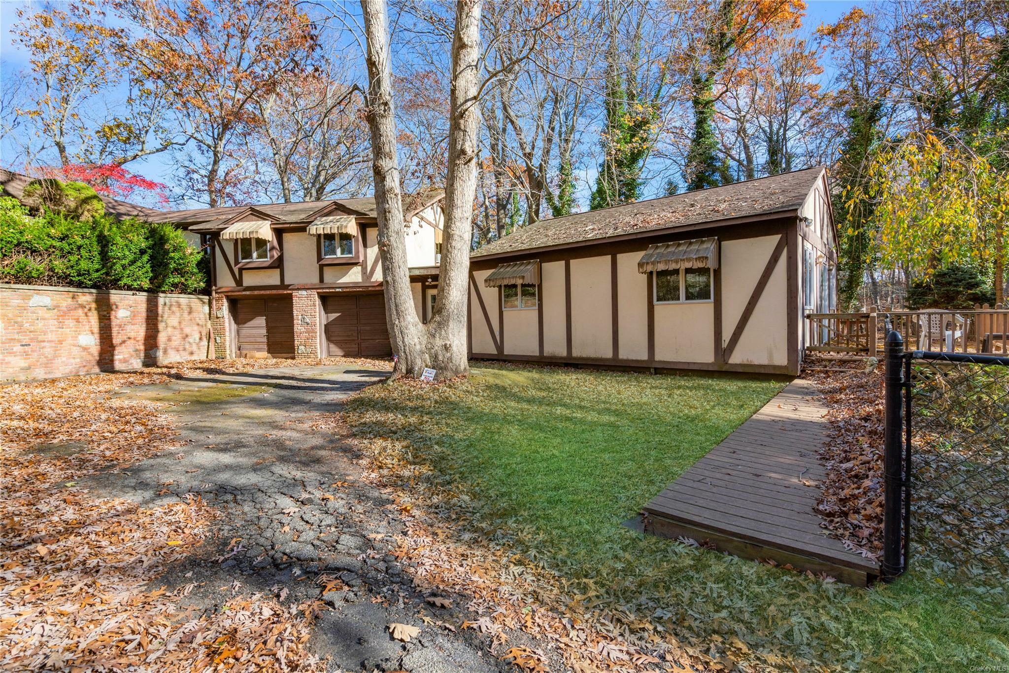 Property Photo:  114 Oakwood Drive  NY 11792 