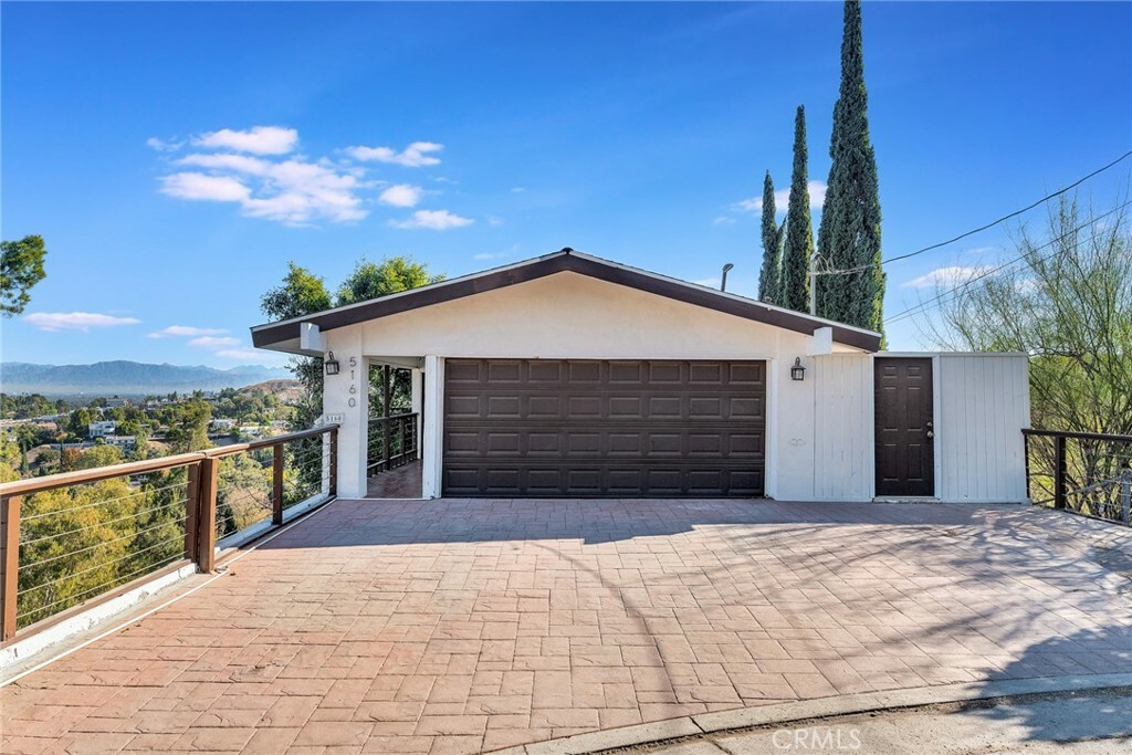 Property Photo:  5160 Medina Road  CA 91364 