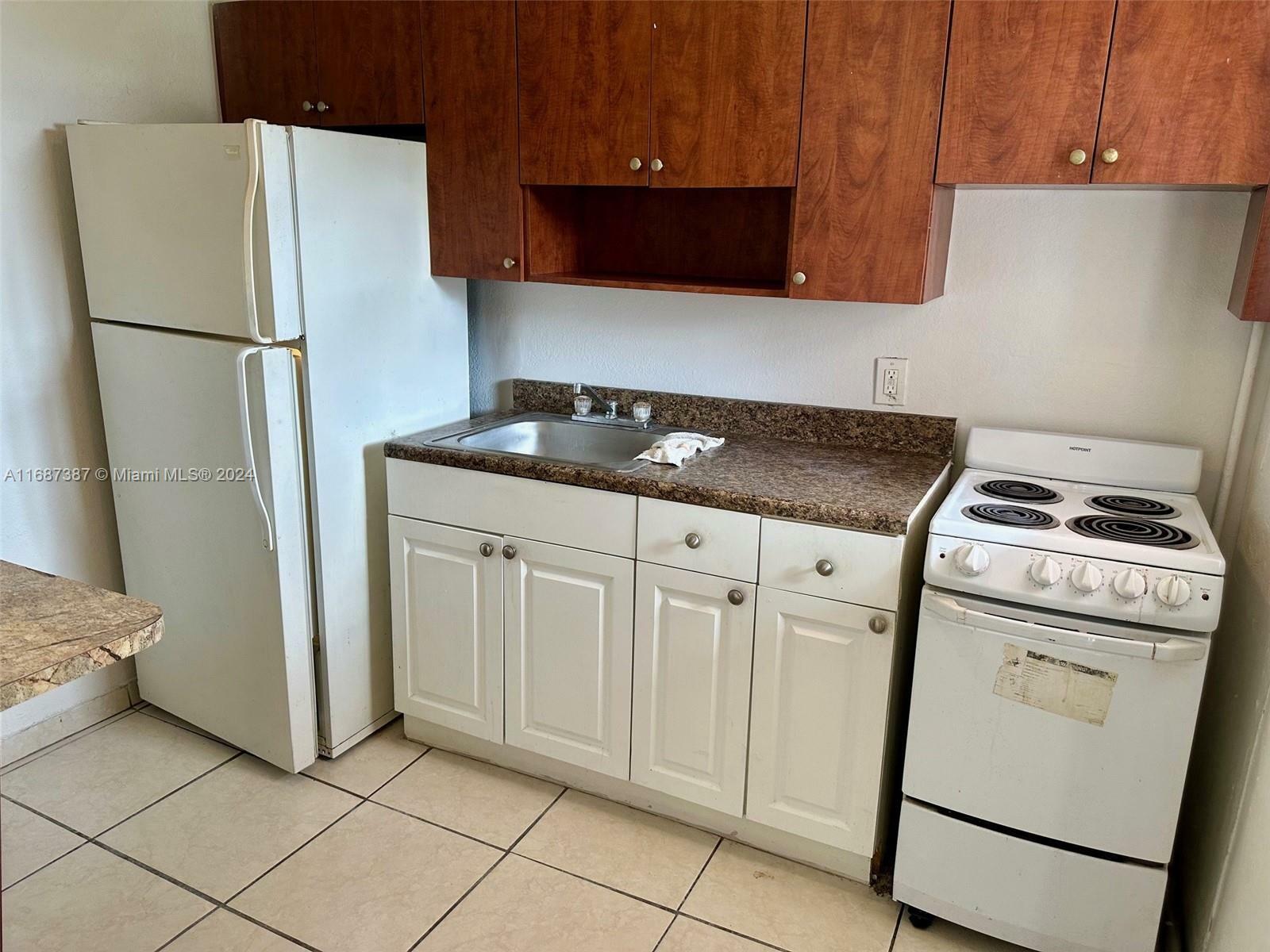 Property Photo:  6020 NW 13th Ave 12  FL 33142 