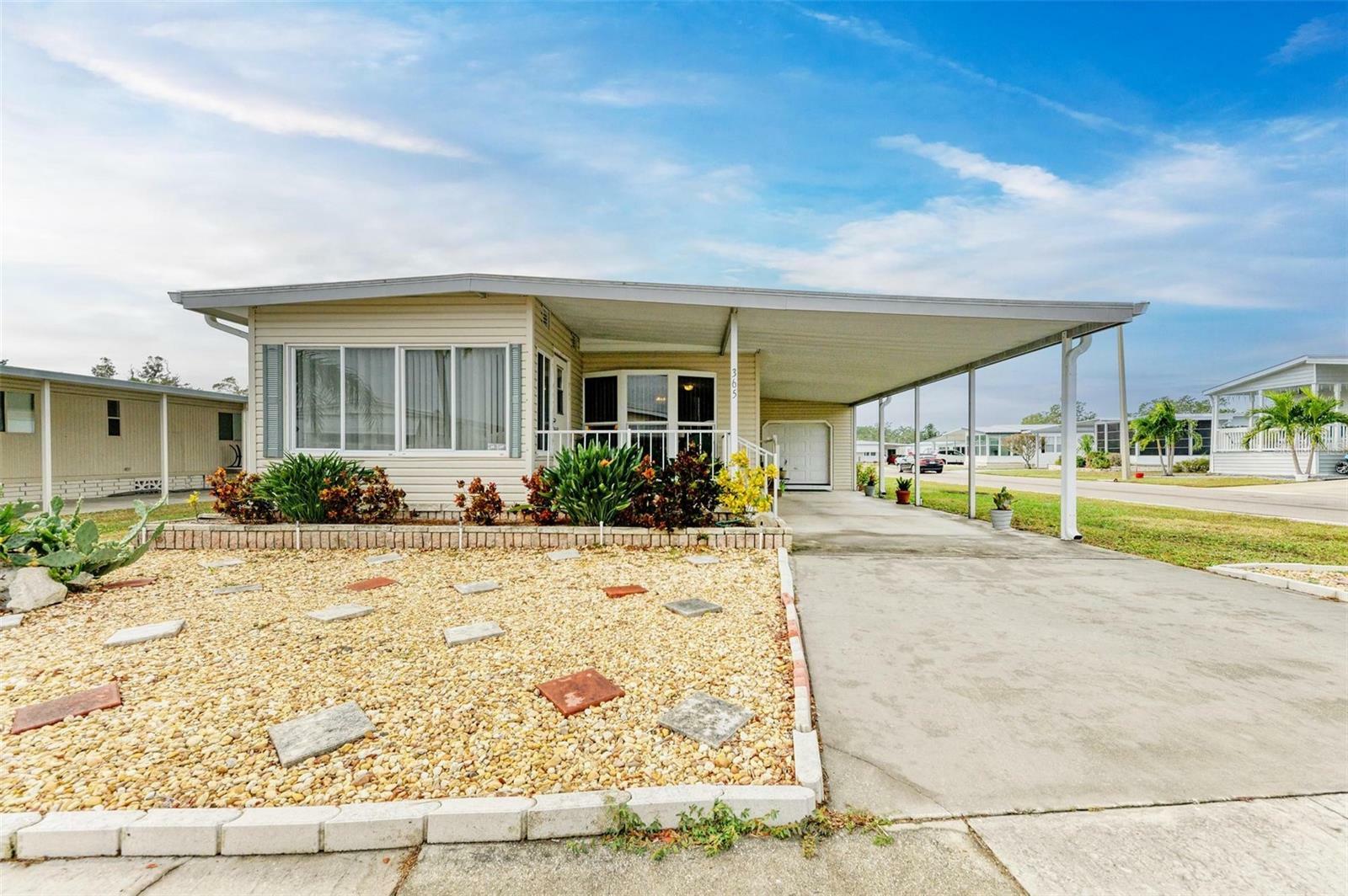 Property Photo:  5619 Bayshore Road 365  FL 34221 