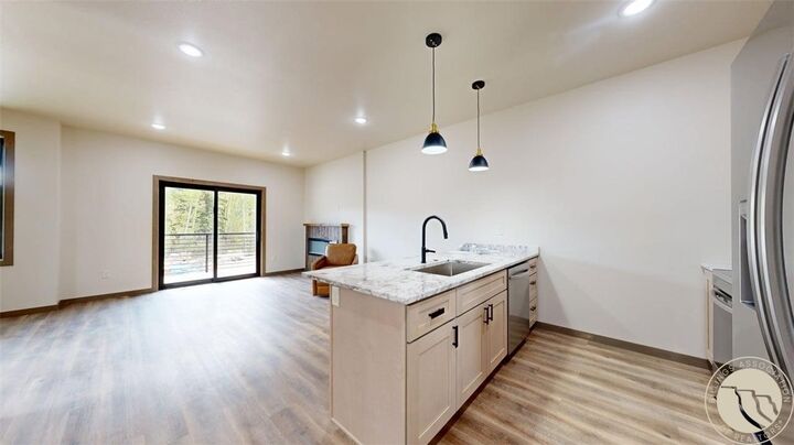Property Photo:  1 A Timberline Townhomes  MT 59068 