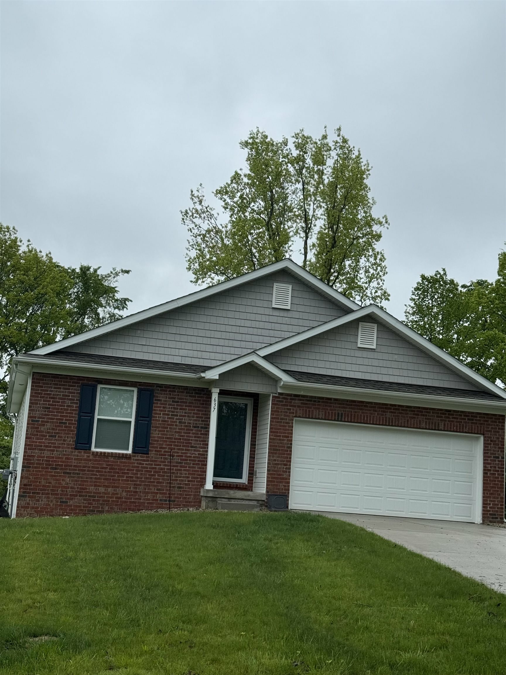 Property Photo: 637 Woodvalley Drive MI 48817