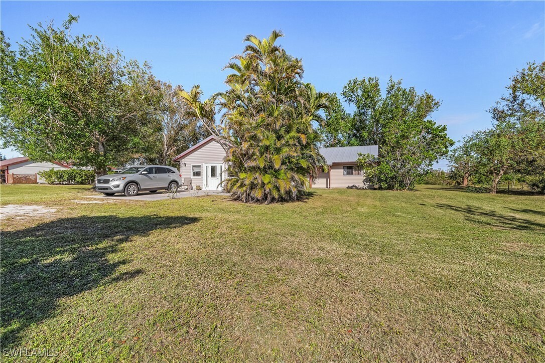 Property Photo:  4754 Woodstock Road  FL 33956 