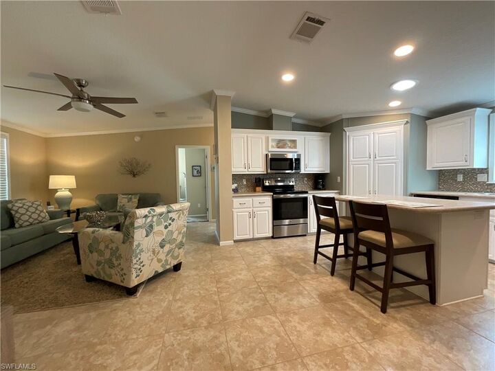 Property Photo:  423 Palm Dr 313  FL 34114 