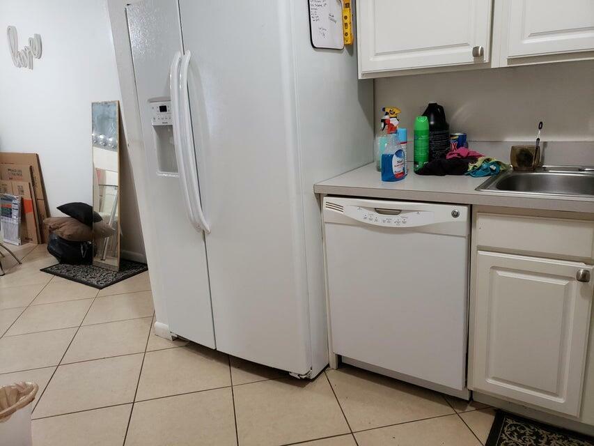 Property Photo:  475 SE 8th Street 114  FL 33441 