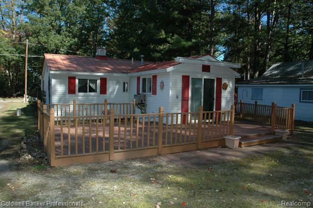 Property Photo:  1940 Bobwhite Road  MI 48750 