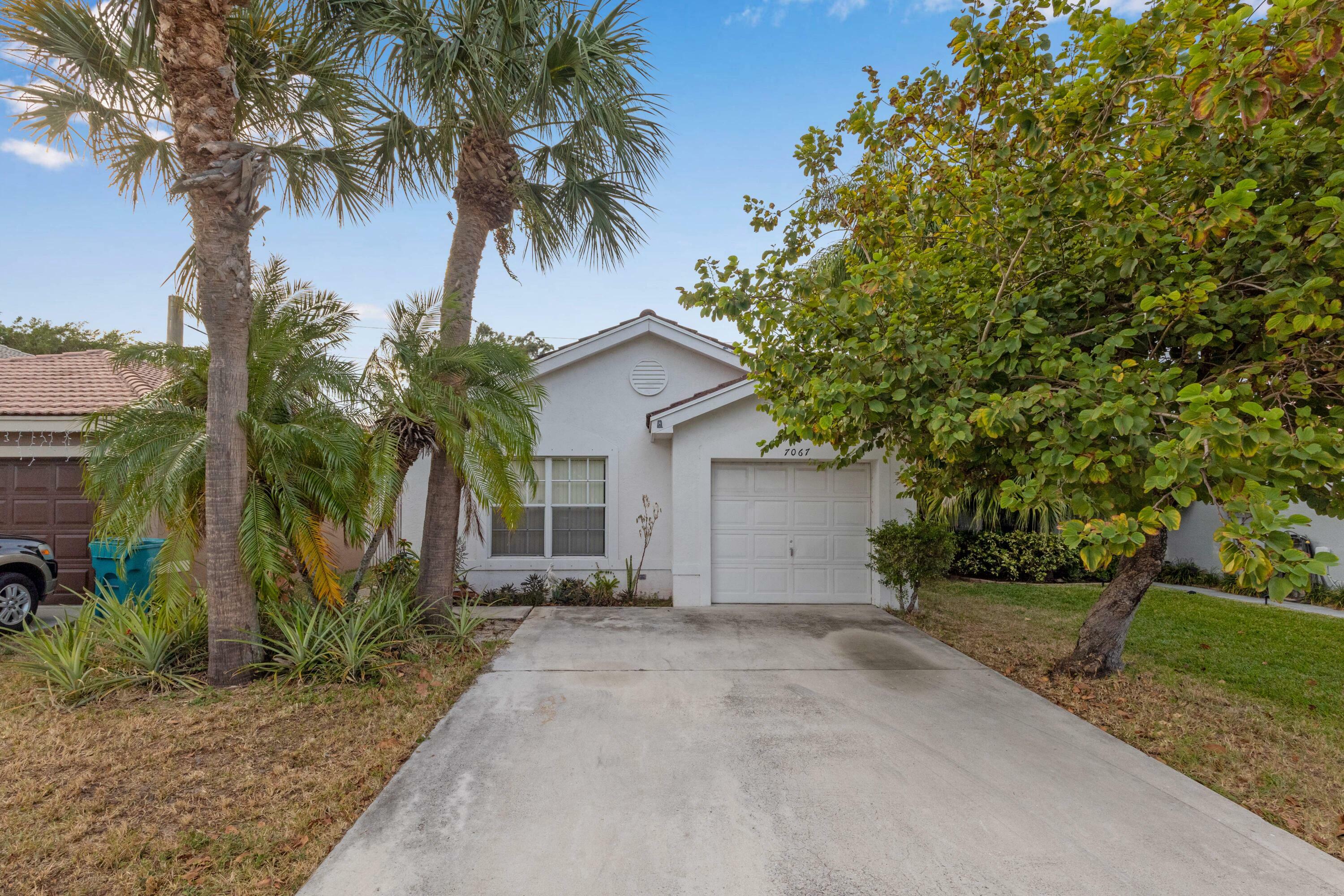 Property Photo:  7067 Chesapeake Circle  FL 33436 