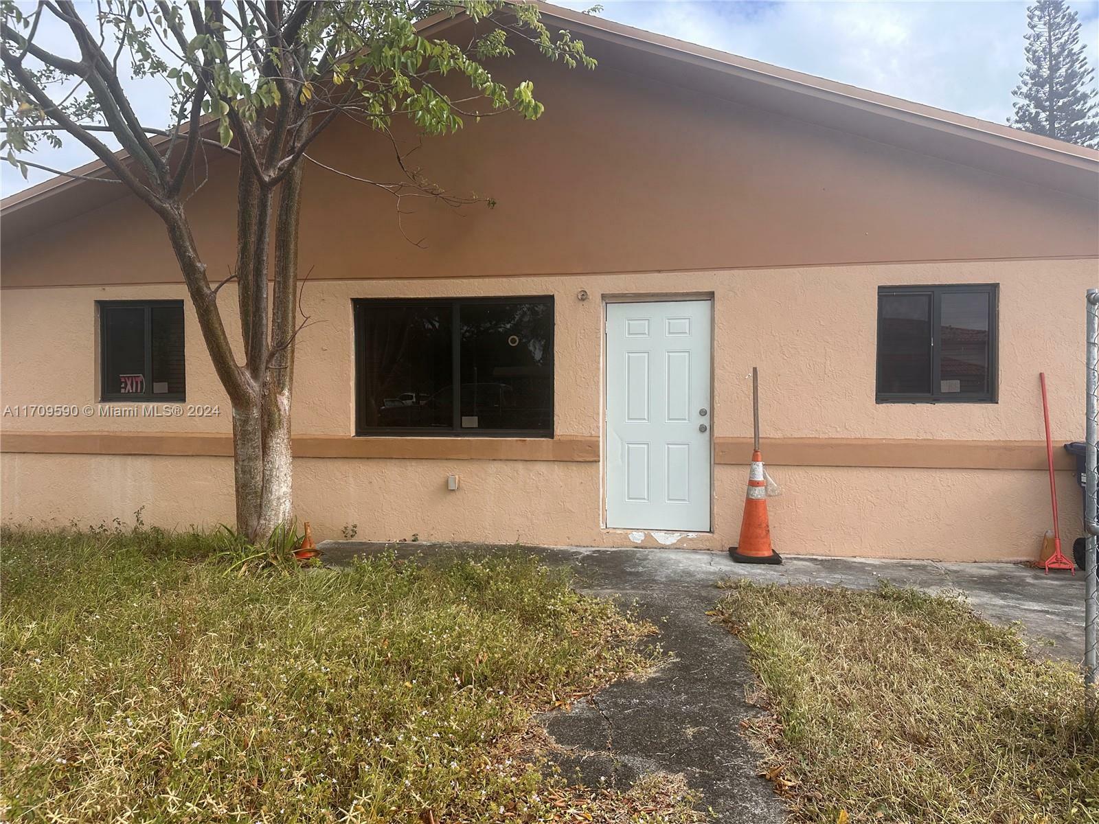 Property Photo:  15665 NW 42nd Ave  FL 33054 