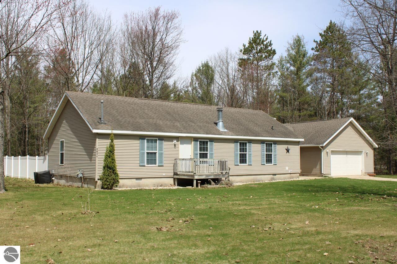 Property Photo:  2071 NE Driftwood Lane  MI 49646 