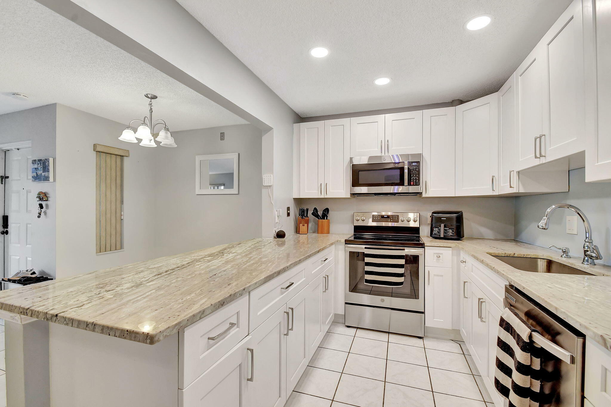 Property Photo: 713 Sunny Pine Way F2 FL 33415