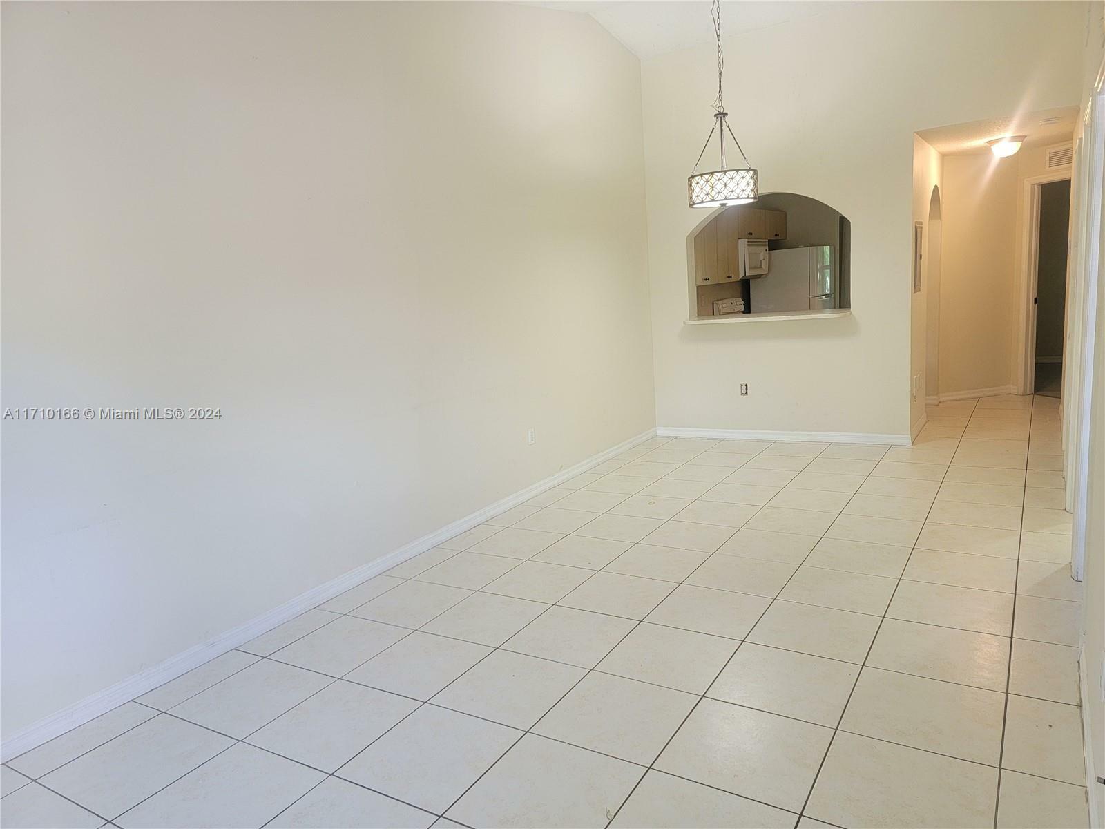 Property Photo:  1240 SE 31st Ct 202-32  FL 33035 