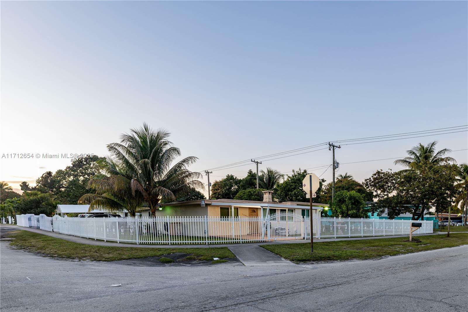 Property Photo:  11704 NW 11th Ave  FL 33168 