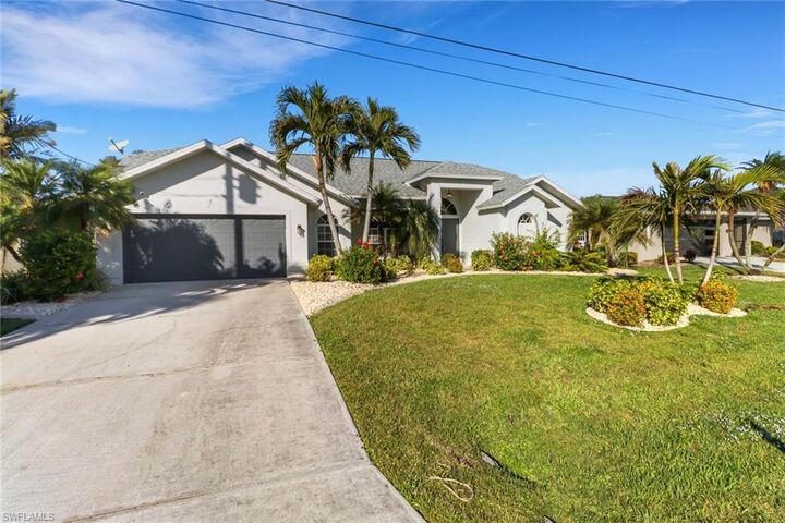 Property Photo:  1423 SW 49th St  FL 33914 