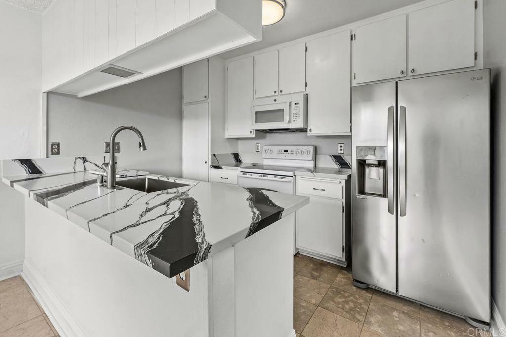Property Photo: 3215 Midway 704 CA 92110