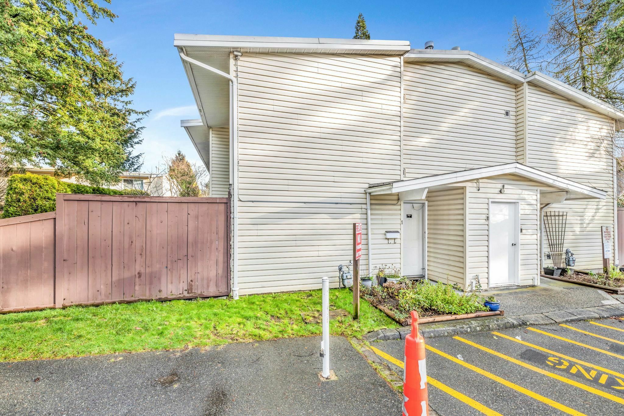 Property Photo: 9400 122 Street 1 BC V3V 4L6