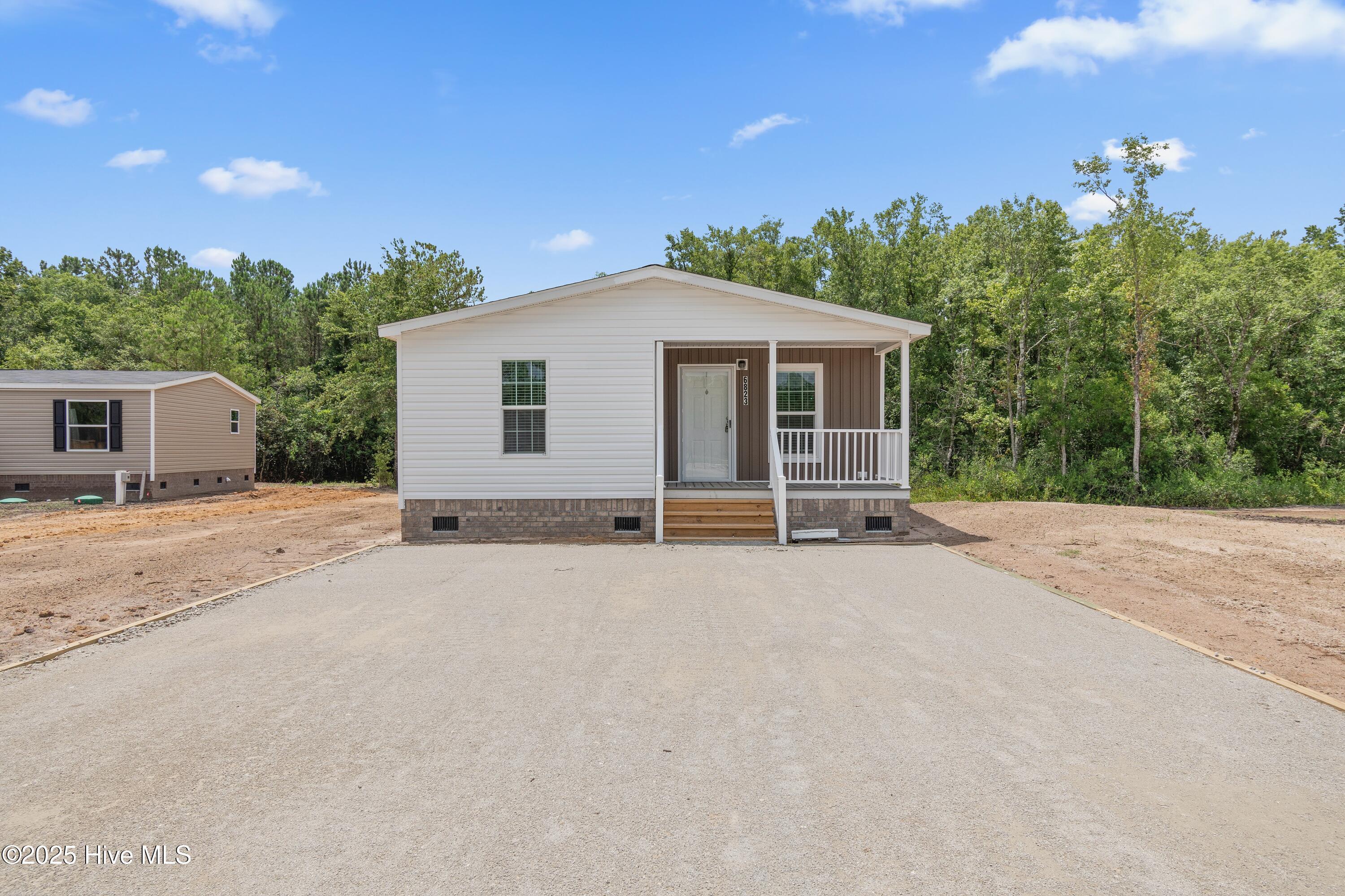 Property Photo:  6823 Lewis Drive SE  NC 28479 