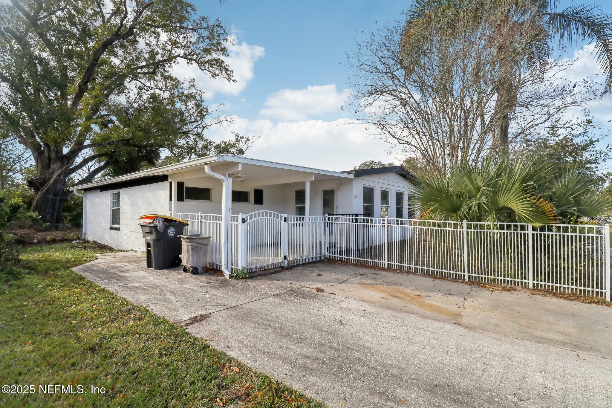 Property Photo:  7028 Delisle Drive  FL 32244 