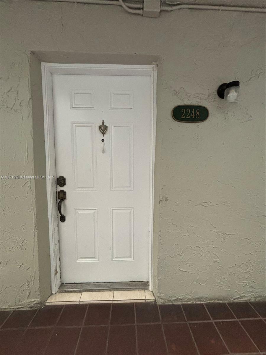 Property Photo:  10000 NW 80th Ct 2248  FL 33016 