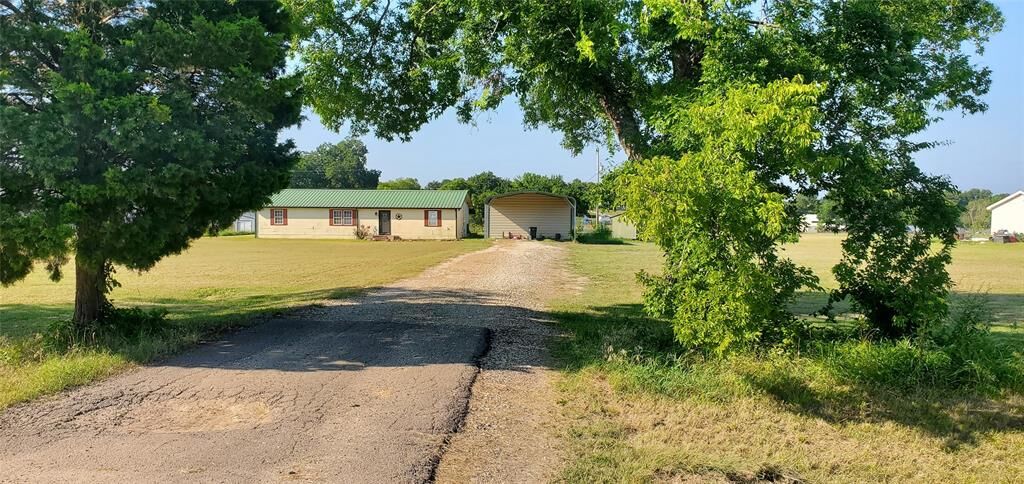 Property Photo:  7052 S US Highway 69  TX 75453 