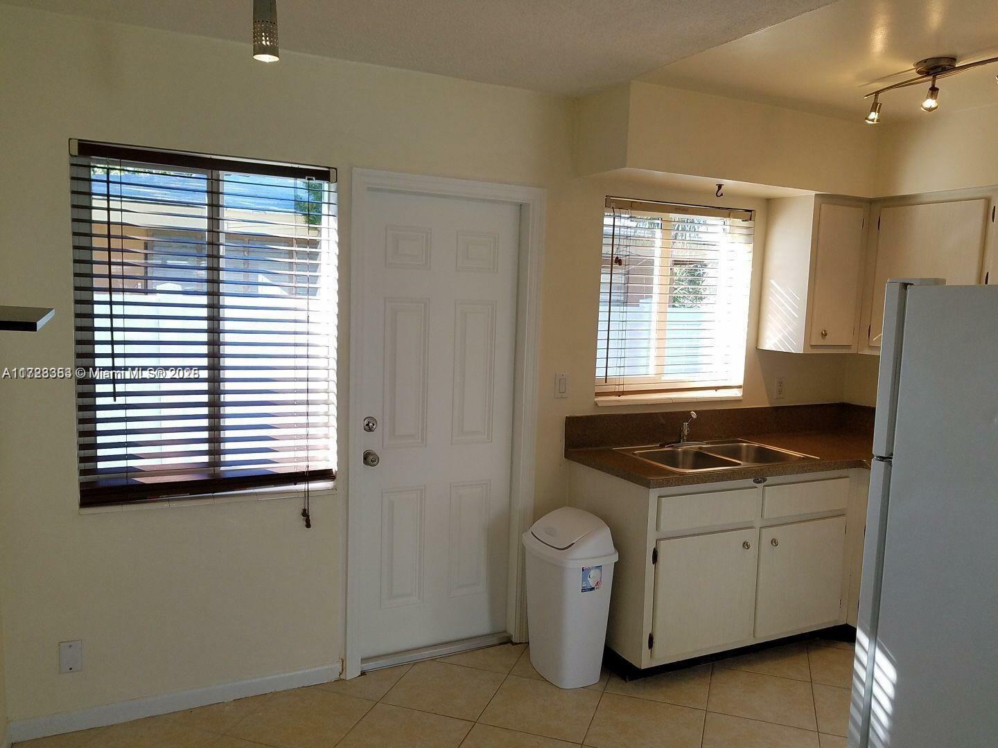 Property Photo:  1231 NE 23rd Ave  FL 33062 