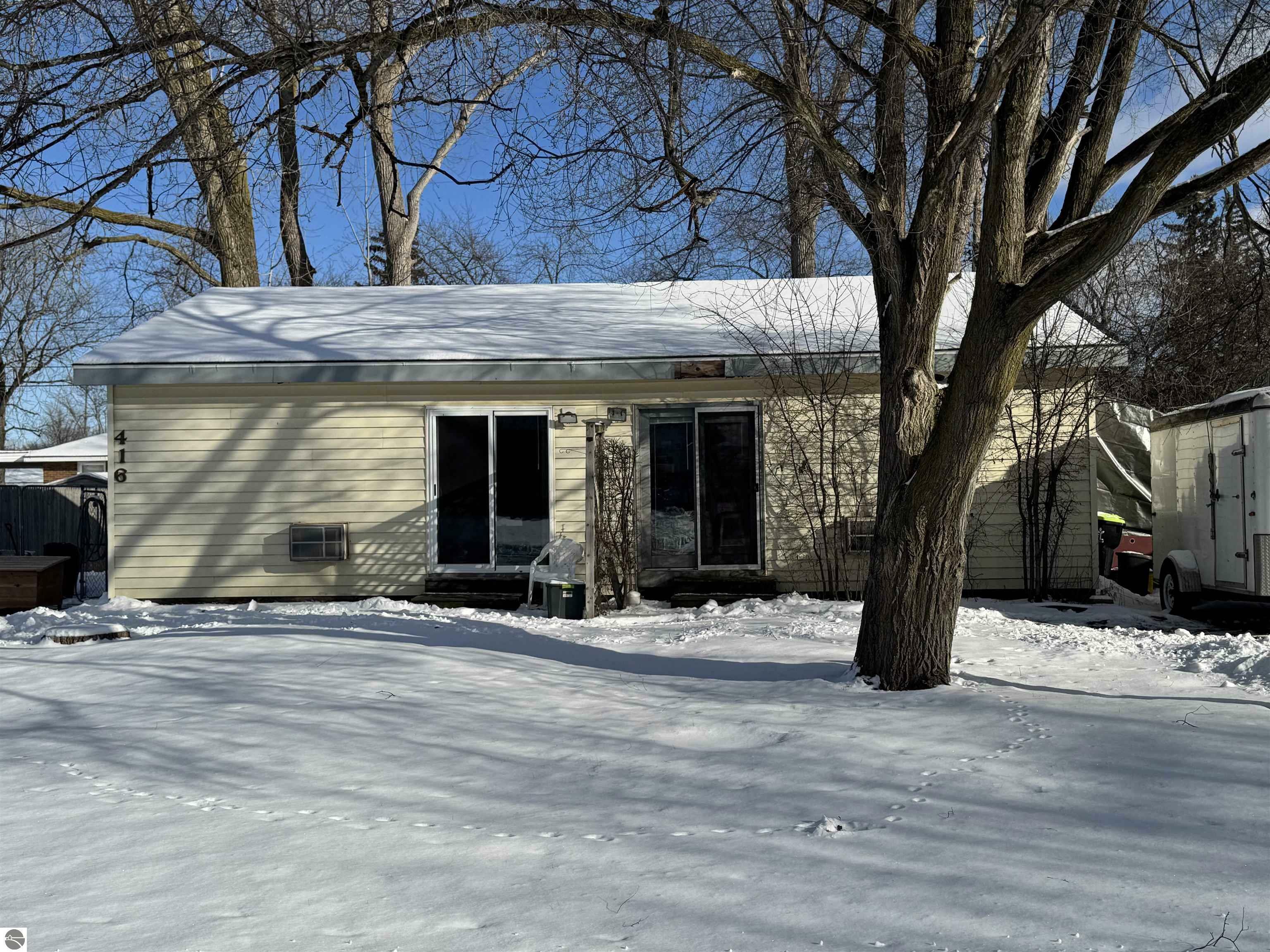 Property Photo:  410/412/414/416 Sam Street  MI 48642 