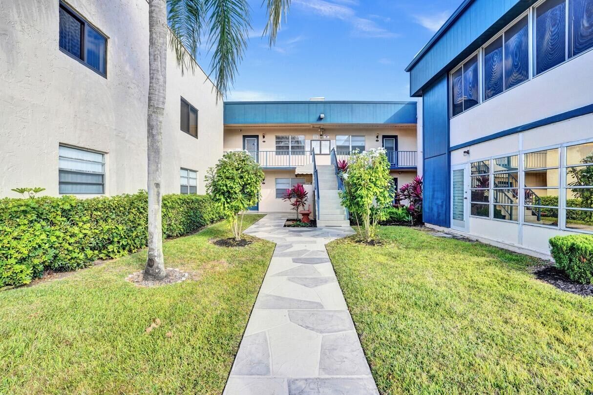 Property Photo:  155 Flanders D  FL 33484 