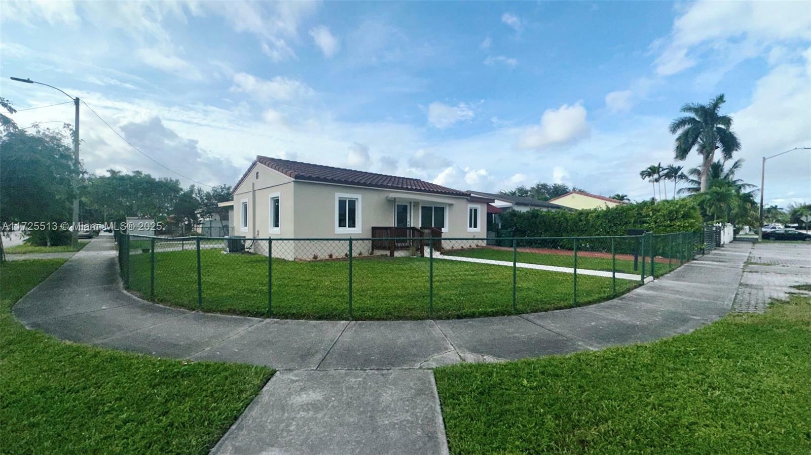 Property Photo:  1840 NW 36th Ave  FL 33125 