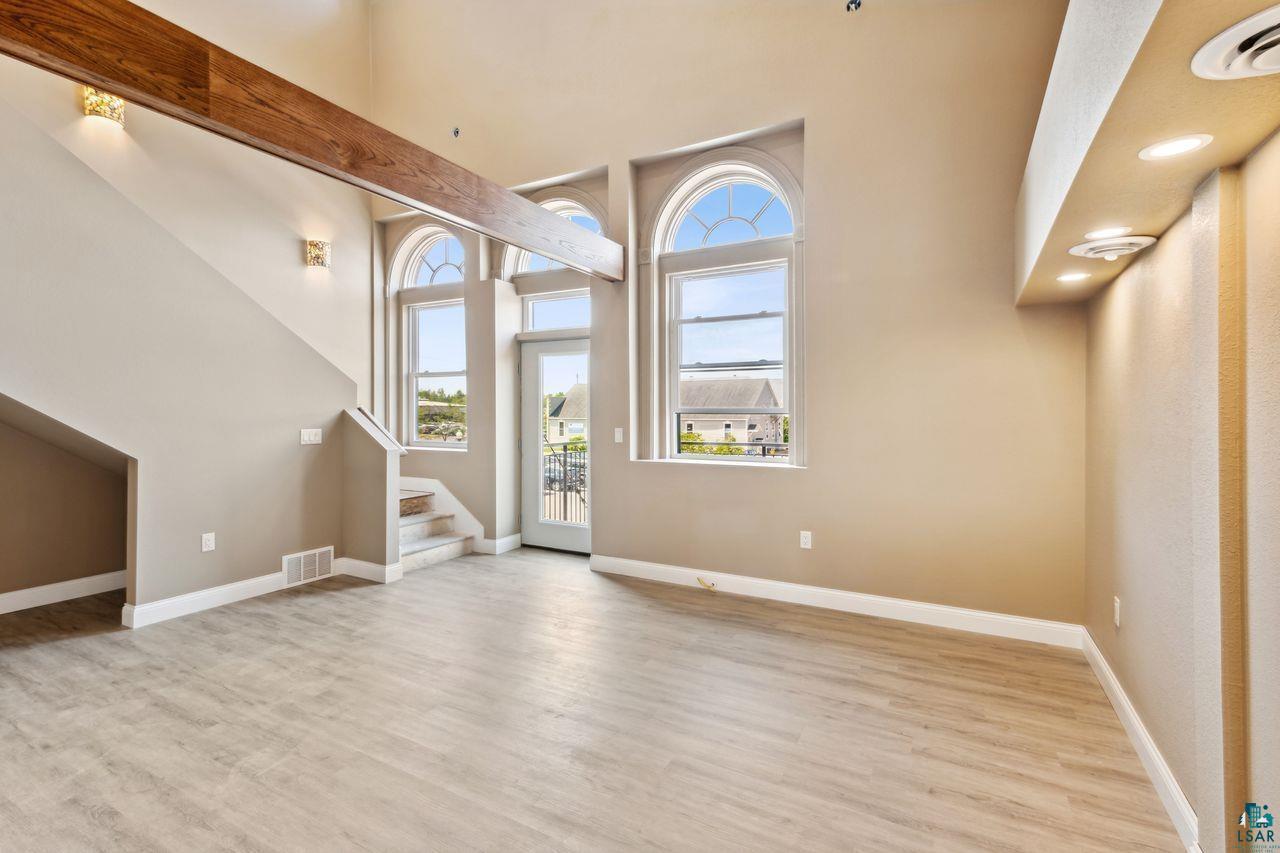 Property Photo: 208 3rd Ave W Unit 202 WI 54806