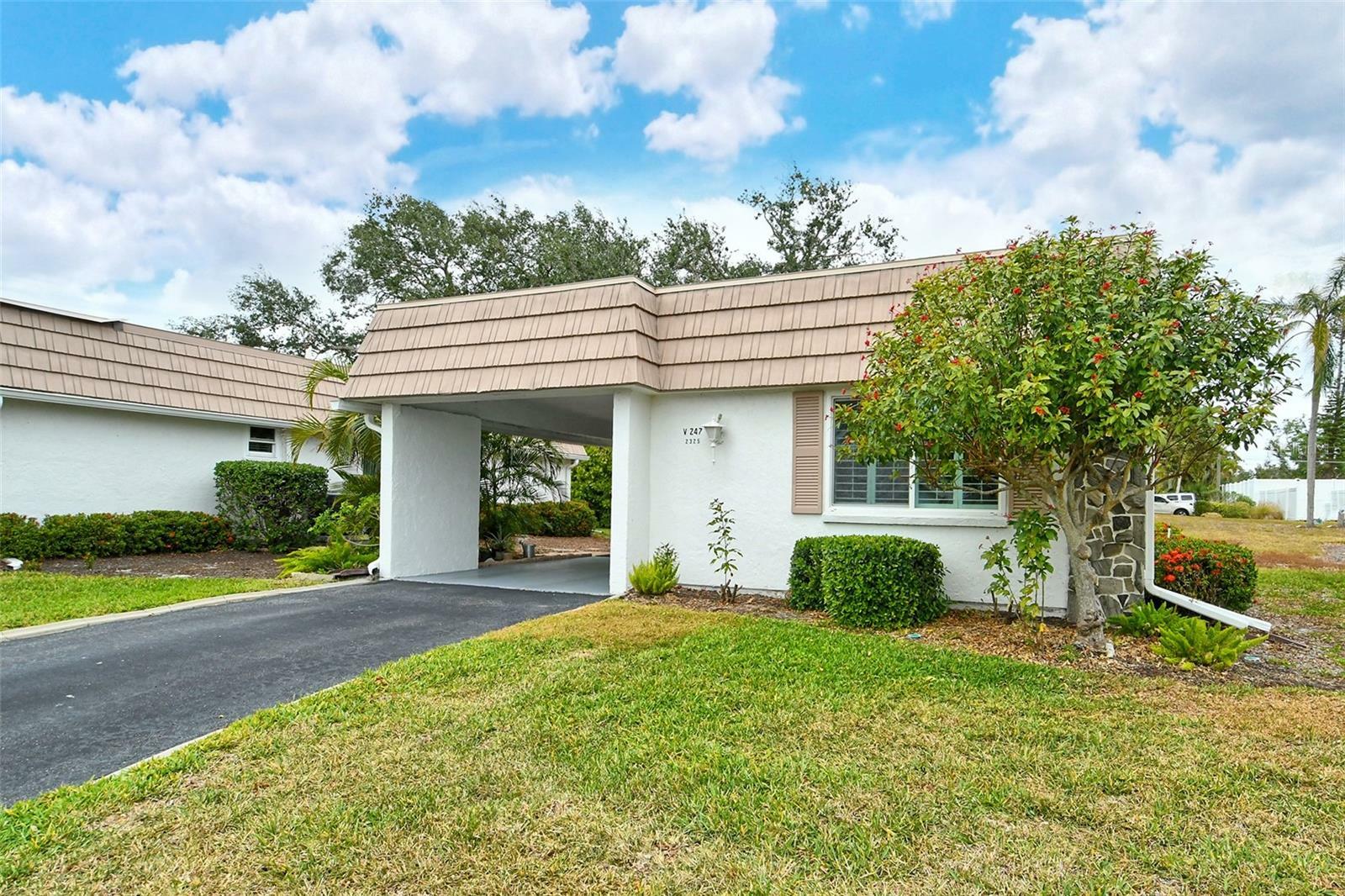 Property Photo:  2325 Riverbluff Parkway V247  FL 34231 