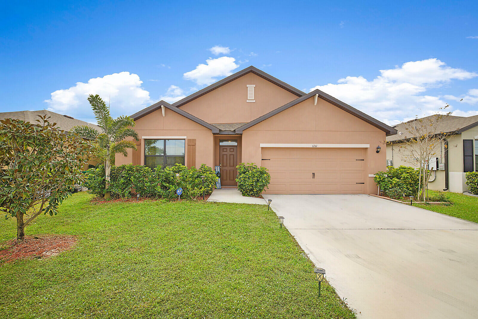 Property Photo:  6241 NW Regent Street  FL 34983 