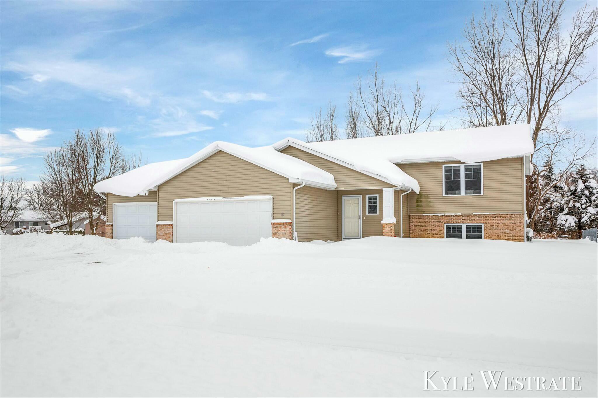 Property Photo:  80 Talon Drive  MI 49404 