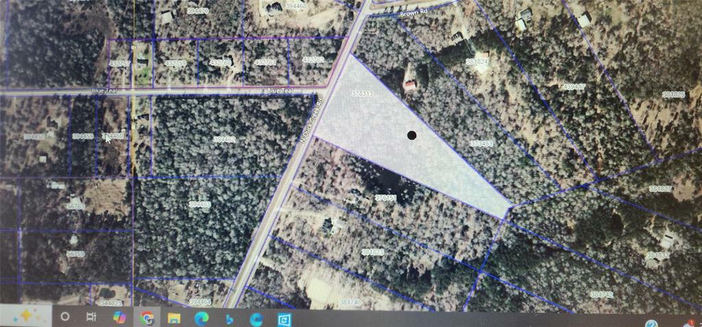 Property Photo: 3890 N Duck Creek Road TX 77328