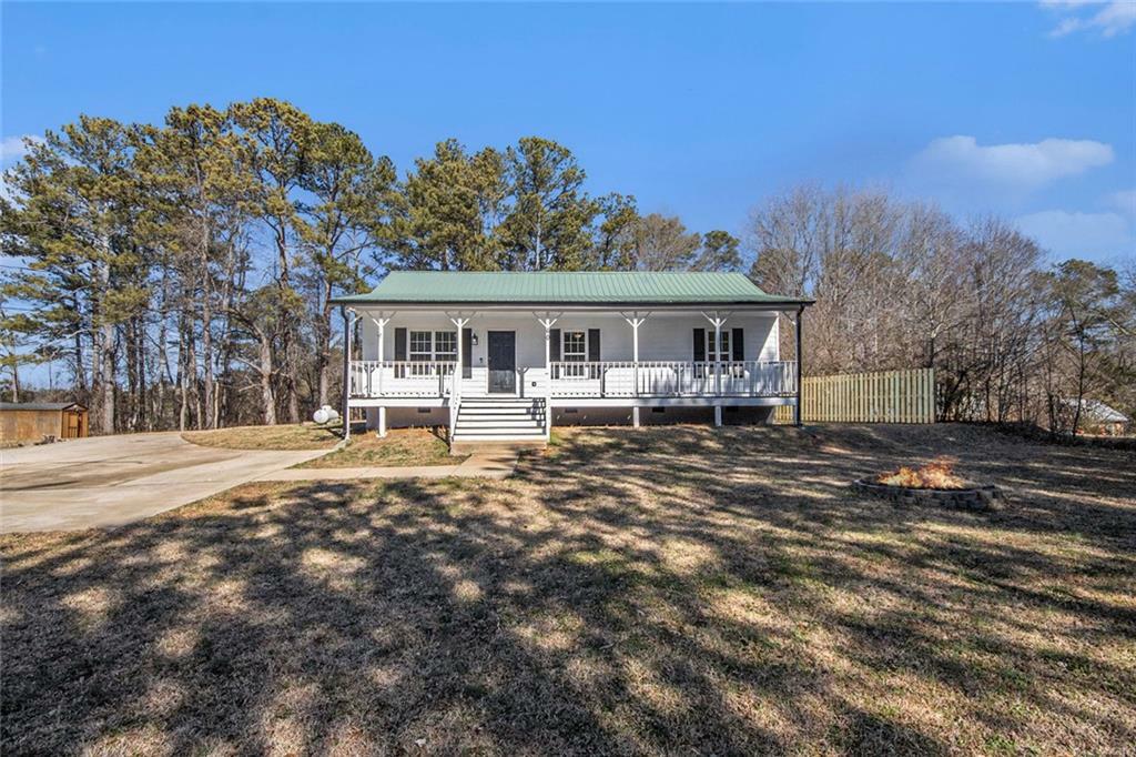 Property Photo:  60 Collins Road  GA 30116 